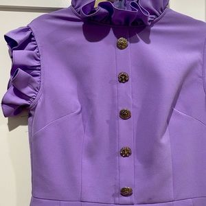 Brand new never worn lavender Aron Fashion ruffle edge dress with accent buttons